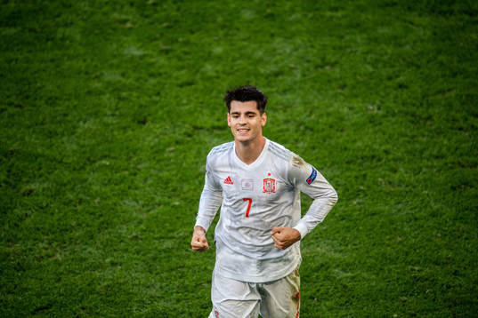 Alvaro Morata of Spain celebrates scoring 3-4