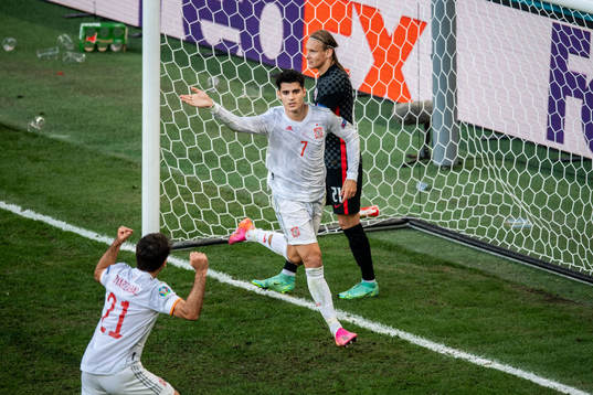 Alvaro Morata of Spain celebrates scoring 3-4