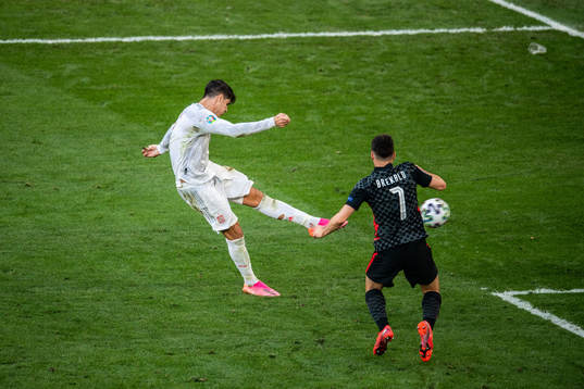 Alvaro Morata of Spain scores 3-4