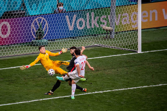 Goalkeeper Dominik Livakovic of Croatia saves a ball from
