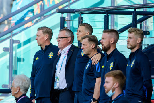 assistant coach Peter Wettergren and head coach Janne