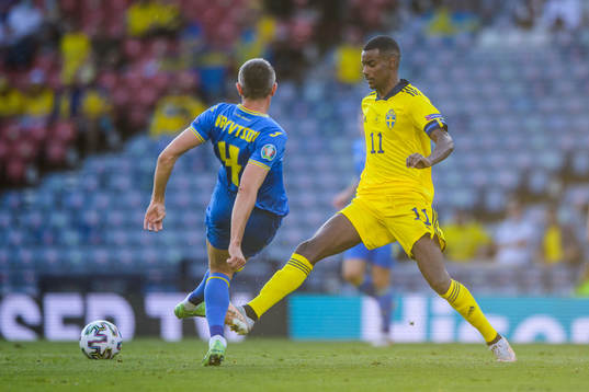 Serhiy Kryvtsov of Ukraine and Alexander Isak of Sweden