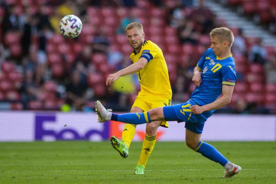 Sebastian Larsson of Sweden and Oleksandr Zinchenko of