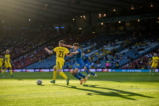 Dejan Kulusevski of Sweden and Mykola Matviyenko of Ukraine