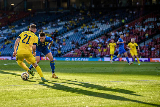 Dejan Kulusevski of Sweden and Mykola Matviyenko of Ukraine
