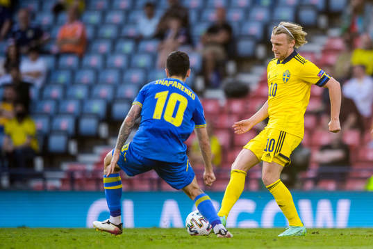 Mykola Shaparenko of Ukraine and Emil Forsberg of Sweden