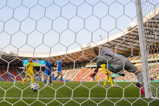Goalkeeper Robin Olsen of Sweden lets in the 0-1 goal