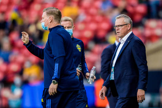 assistant coach Peter Wettergren and head coach Janne