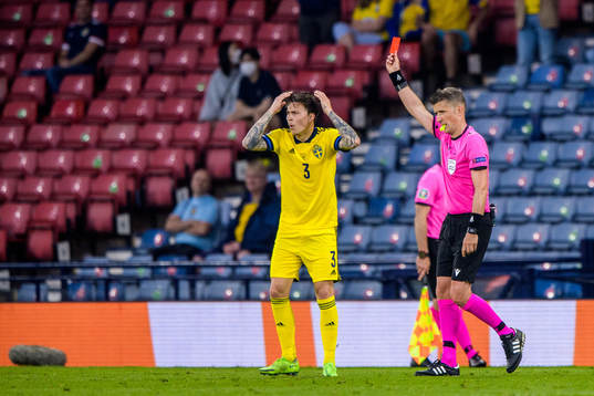 Victor Nilsson Lindelöf of Sweden reacts as referee