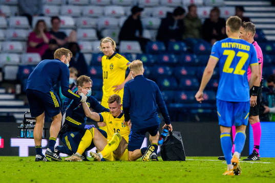 Emil Krafth of Sweden is injured