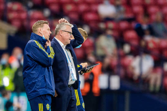 assistant coach Peter Wettergren and head coach Janne