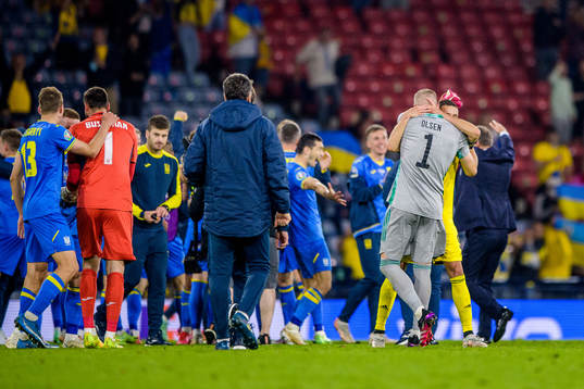 goalkeeper Robin Olsen and Marcus Berg of Sweden look