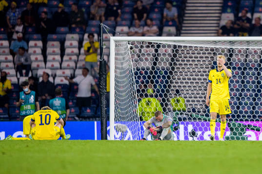 Emil Forsberg, goalkeeper Robin Olsen and Filip Helander of