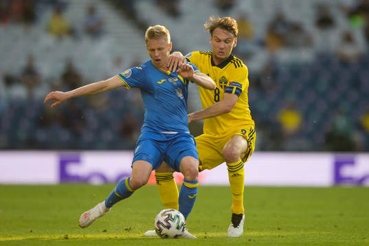 Oleksandr Zinchenko of Ukraine and Albin Ekdal of Sweden