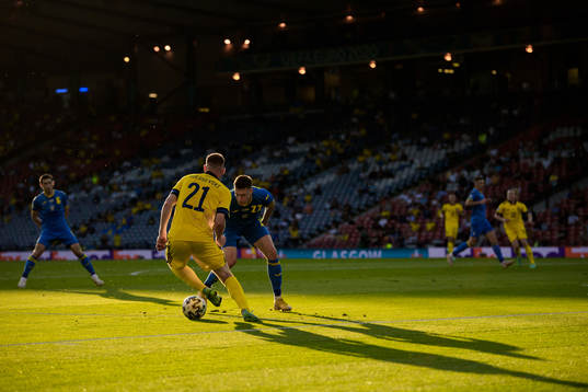 Dejan Kulusevski of Sweden and Mykola Matviyenko of Ukraine