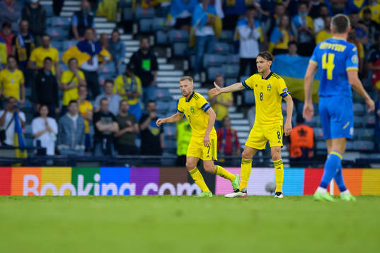 Sebastian Larsson and Albin Ekdal of Sweden plays in front