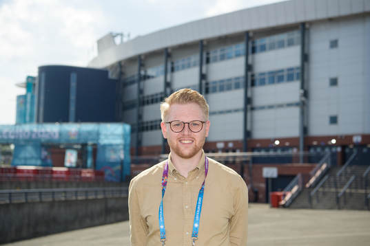 Linus Petersson, reporter Göteborgs-Posten, poses for a