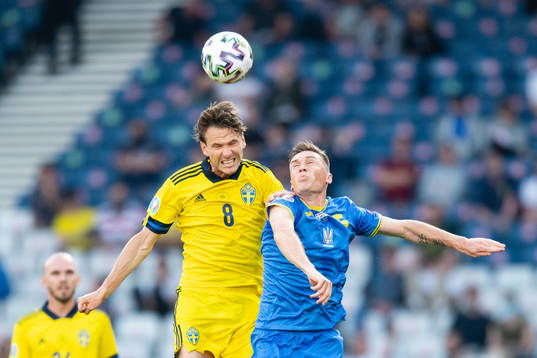 Albin Ekdal of Sweden and Serhiy Sydorchuk of Ukraine