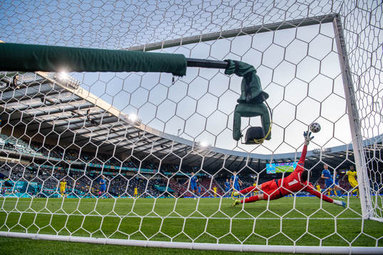 Emil Forsberg of Sweden scores 1-1 behind goalkeeper