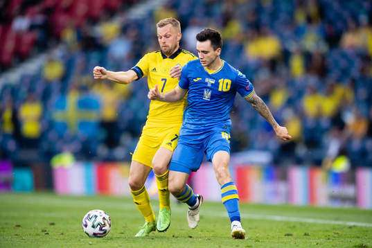 Sebastian Larsson of Sweden and Mykola Shaparenko of Ukraine