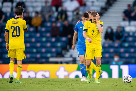 Sebastian Larsson of Sweden looks dejected