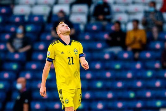 Dejan Kulusevski of Sweden looks dejected