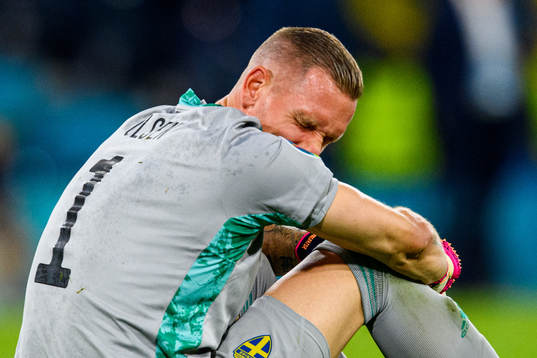 Goalkeeper Robin Olsen of Sweden looks dejected