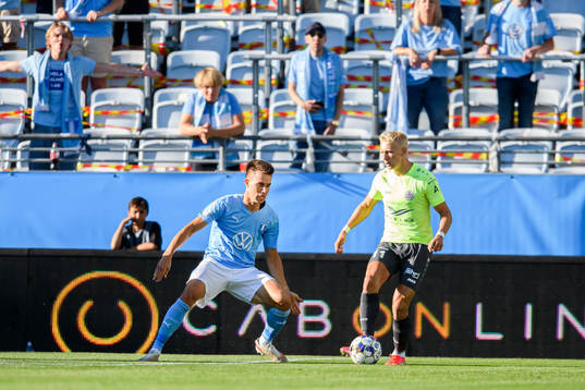 Jonas Knudsen of Malmö FF and Mikael Soisalo of Riga