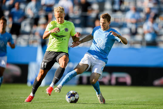 Mikael Soisalo of Riga and Oscar Lewicki of Malmö FF
