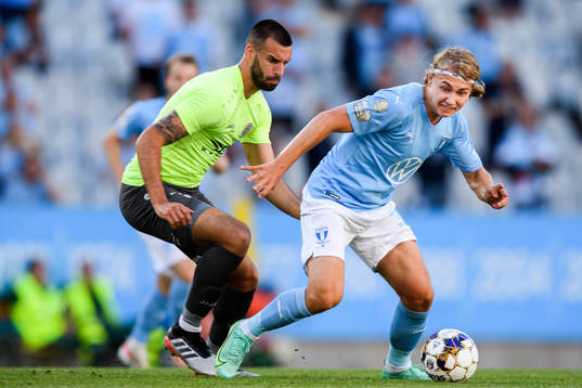 Milos Vranjanin of Riga and Sebastian Nanasi +of Malmö FF