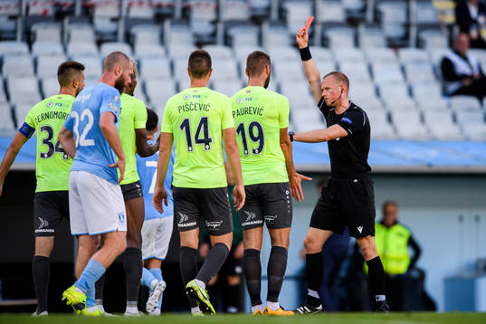 Yunusa Owolabi Muritala of Riga receives a red card