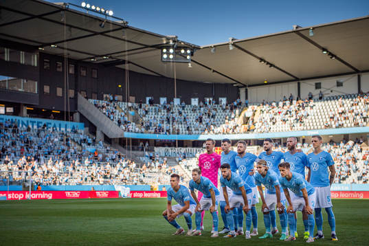 Players of Malmö FF line up for a team photo ahead the