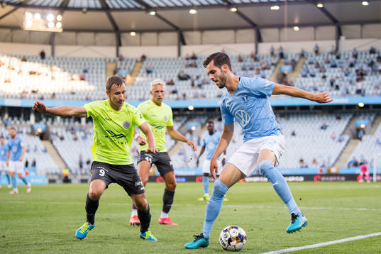 Armands Petersons of Riga and Adi Nalic of Malmö FF