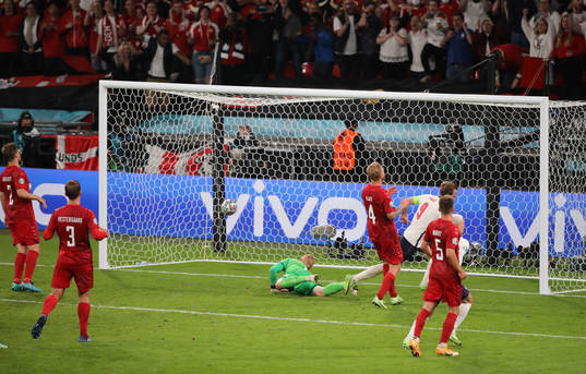 Harry Kane of England score the 2-1 goal behind Goalkeeper