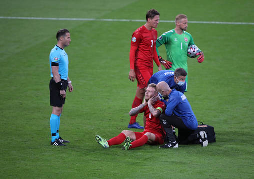 Simon Kjaer of Denmark in pain