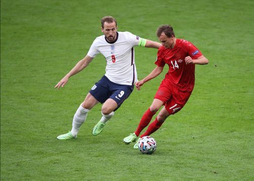 Mikkel Damsgaard of Denmark and Harry Kane of England