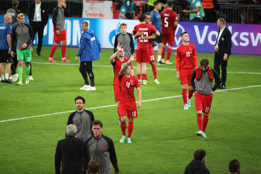 Players of Denmark look dejected