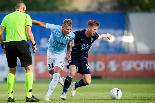 Wesley Nata of Riga and Anders Christiansen of Malmö FF