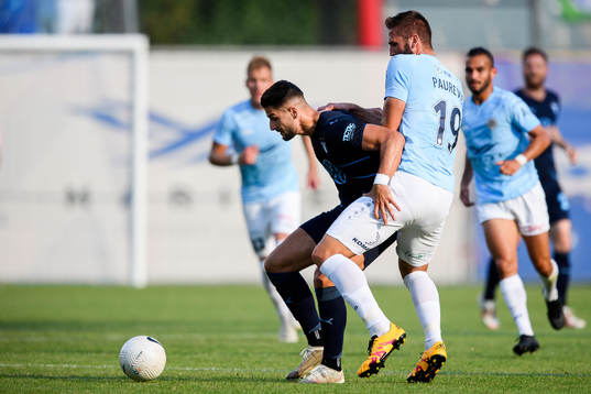 Antonio Colak of Malmö FF and Ivan Paurevic of Riga