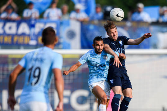 Felipe Brisola of Riga and Oscar Lewicki of Malmö FF