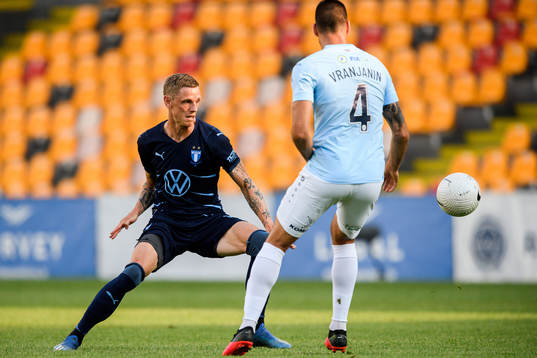 Sören Rieks of Malmö FF and Milos Vranjanin of Riga