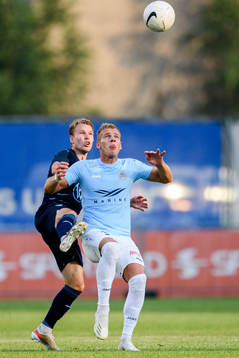 Oscar Lewicki of Malmö FF and Wesley Nata of Riga