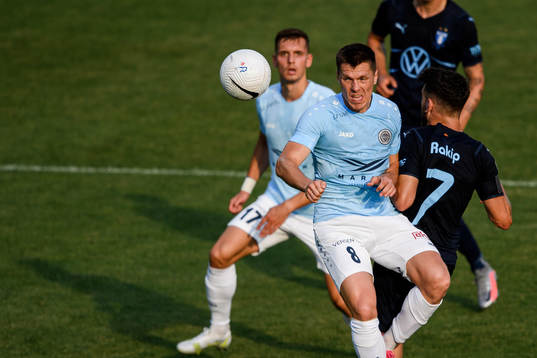 Ritvars Rugins of Riga and Erdal Rakip of Malmö FF