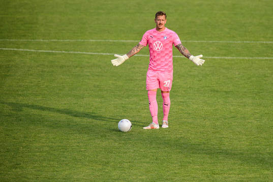 Goalkeeper Johan Dahlin of Malmö FF looks dejected