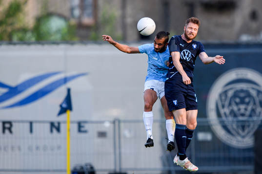 Felipe Brisola of Riga and Lasse Nielsen of Malmö FF