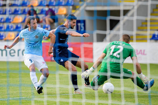 Antonio Colak of Malmö FF against Armands Petersons and