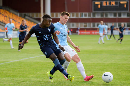 Bonke Innocent of Malmö FF and Ritvars Rugins of Riga