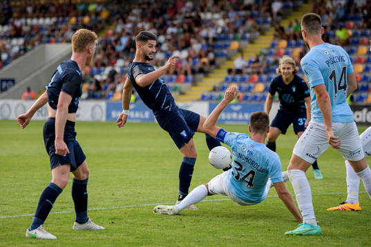 Antonio Colak of Malmö FF and Antonijs Cernomordijs of Riga