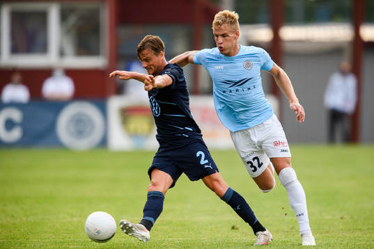 Eric Larsson of Malmö FF and Wesley Nata of Riga