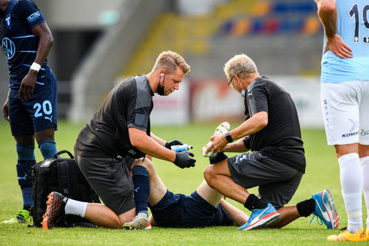 Oscar Lewicki of Malmö FF receives medicinal treatment